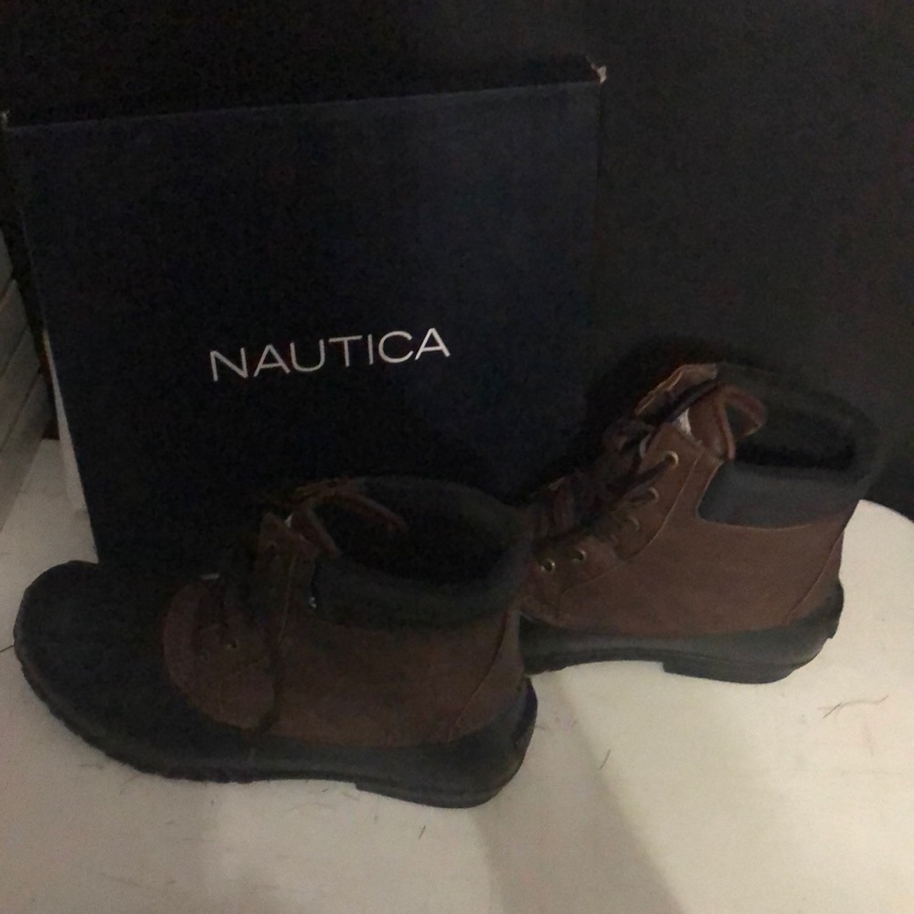 Men’s cold weather boots. They have been worn once. Smoke free environment..